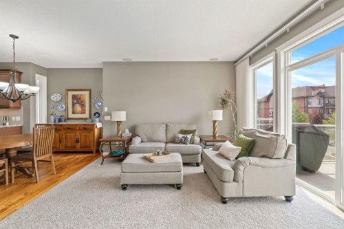 204 Sunset Square, Cochrane, AB - Indoor Photo Showing Living Room