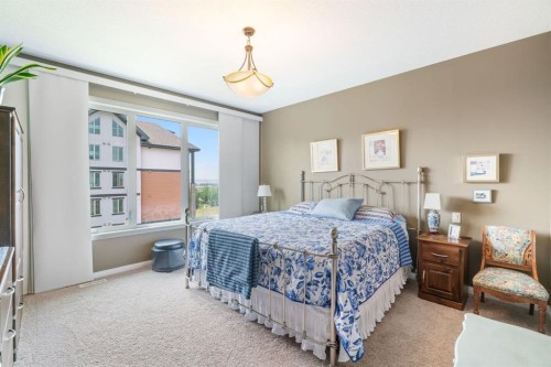 204 Sunset Square, Cochrane, AB - Indoor Photo Showing Bedroom