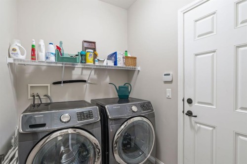 204 Sunset Square, Cochrane, AB - Indoor Photo Showing Laundry Room