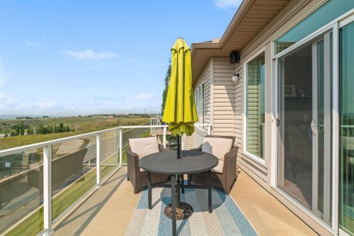 204 Sunset Square, Cochrane, AB - Outdoor With Deck Patio Veranda With Exterior