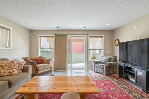 204 Sunset Square, Cochrane, AB - Indoor Photo Showing Living Room