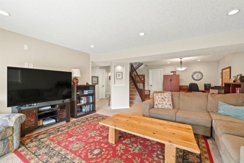 204 Sunset Square, Cochrane, AB - Indoor Photo Showing Living Room