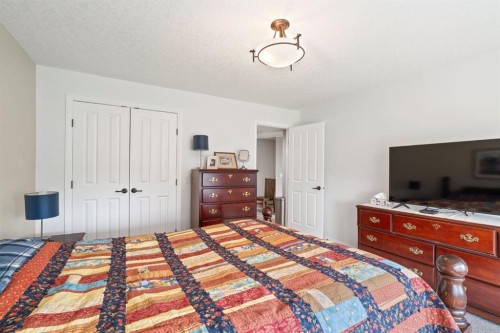 204 Sunset Square, Cochrane, AB - Indoor Photo Showing Bedroom