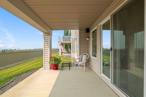204 Sunset Square, Cochrane, AB - Outdoor With Deck Patio Veranda With Exterior