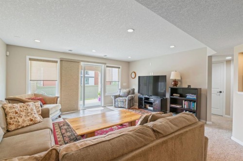 204 Sunset Square, Cochrane, AB - Indoor Photo Showing Living Room