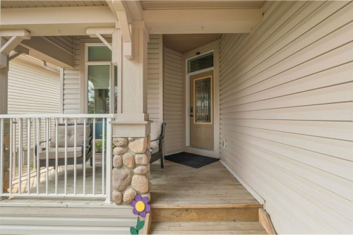204 Sunset Square, Cochrane, AB - Outdoor With Deck Patio Veranda With Exterior