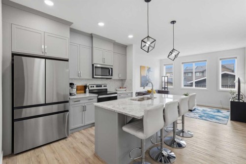 144 Amblehurst Green Nw, Calgary, AB - Indoor Photo Showing Kitchen With Stainless Steel Kitchen With Upgraded Kitchen