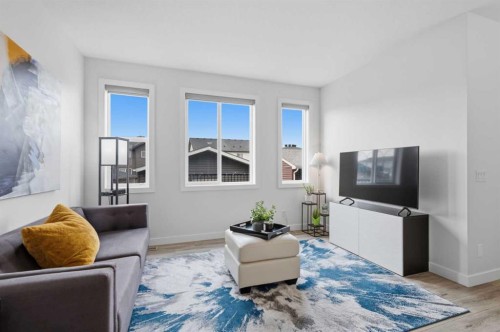 144 Amblehurst Green Nw, Calgary, AB - Indoor Photo Showing Living Room