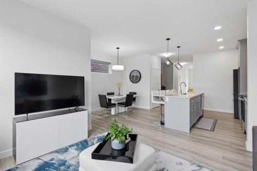 144 Amblehurst Green Nw, Calgary, AB - Indoor Photo Showing Living Room