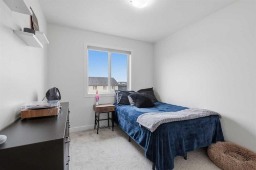 144 Amblehurst Green Nw, Calgary, AB - Indoor Photo Showing Bedroom