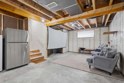 144 Amblehurst Green Nw, Calgary, AB - Indoor Photo Showing Basement