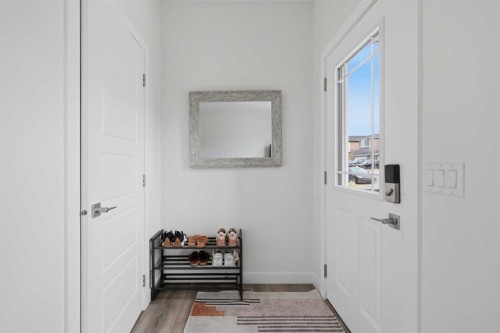 144 Amblehurst Green Nw, Calgary, AB - Indoor Photo Showing Other Room