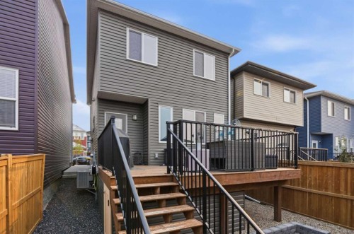 144 Amblehurst Green Nw, Calgary, AB - Outdoor With Deck Patio Veranda With Exterior