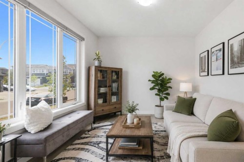 144 Amblehurst Green Nw, Calgary, AB - Indoor Photo Showing Living Room