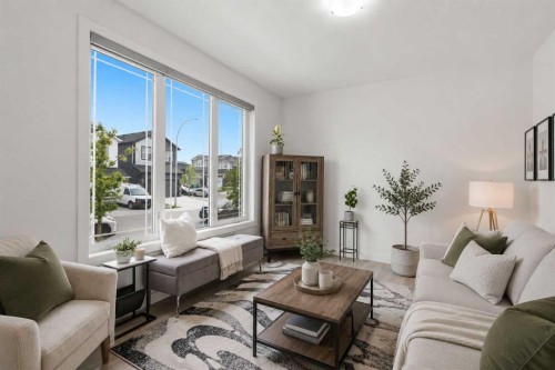 144 Amblehurst Green Nw, Calgary, AB - Indoor Photo Showing Living Room