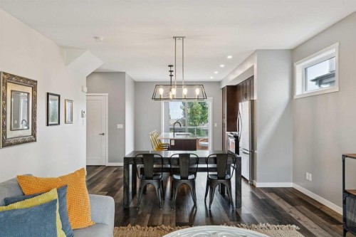 102 Shawnee Common Sw, Calgary, AB - Indoor Photo Showing Dining Room
