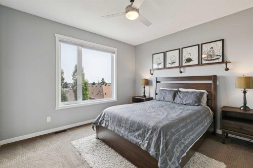 102 Shawnee Common Sw, Calgary, AB - Indoor Photo Showing Bedroom
