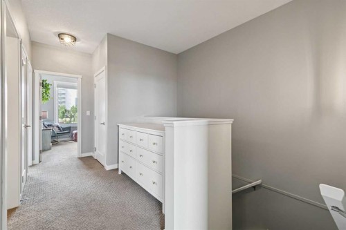 102 Shawnee Common Sw, Calgary, AB - Indoor Photo Showing Other Room