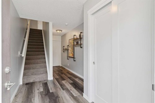 102 Shawnee Common Sw, Calgary, AB - Indoor Photo Showing Other Room