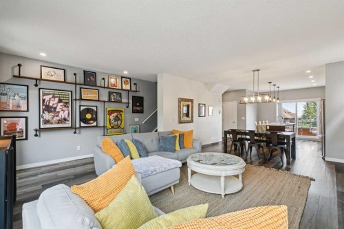102 Shawnee Common Sw, Calgary, AB - Indoor Photo Showing Living Room