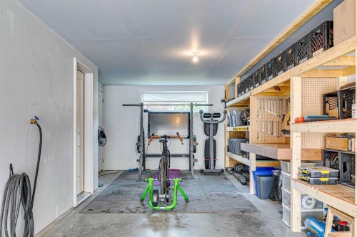 102 Shawnee Common Sw, Calgary, AB - Indoor Photo Showing Gym Room