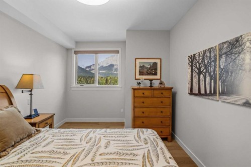 307-1505 Spring Creek Gate, Canmore, AB - Indoor Photo Showing Bedroom