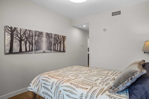 307-1505 Spring Creek Gate, Canmore, AB - Indoor Photo Showing Bedroom