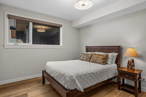 307-1505 Spring Creek Gate, Canmore, AB - Indoor Photo Showing Bedroom