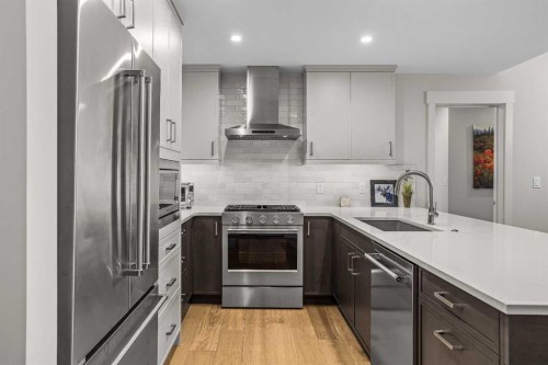 307-1505 Spring Creek Gate, Canmore, AB - Indoor Photo Showing Kitchen With Upgraded Kitchen