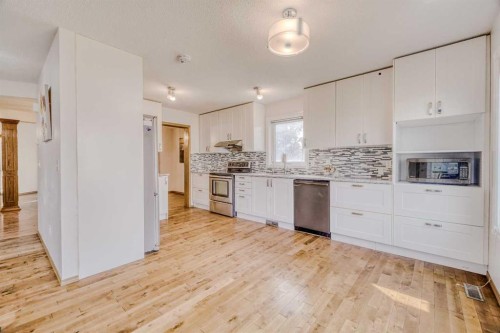 10057 Hamptons Boulevard Nw, Calgary, AB - Indoor Photo Showing Kitchen With Upgraded Kitchen