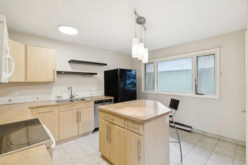 3816 26 Avenue Sw, Calgary, AB - Indoor Photo Showing Kitchen With Double Sink