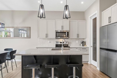 113 Marina Key, Chestermere, AB - Indoor Photo Showing Kitchen With Stainless Steel Kitchen With Upgraded Kitchen