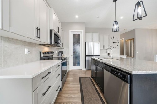 113 Marina Key, Chestermere, AB - Indoor Photo Showing Kitchen With Stainless Steel Kitchen With Upgraded Kitchen