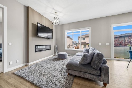 113 Marina Key, Chestermere, AB - Indoor Photo Showing Living Room With Fireplace