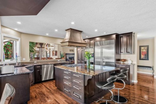 85 Sunset Way Se, Calgary, AB - Indoor Photo Showing Kitchen With Upgraded Kitchen