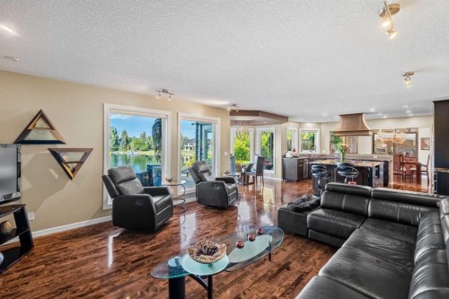 85 Sunset Way Se, Calgary, AB - Indoor Photo Showing Living Room