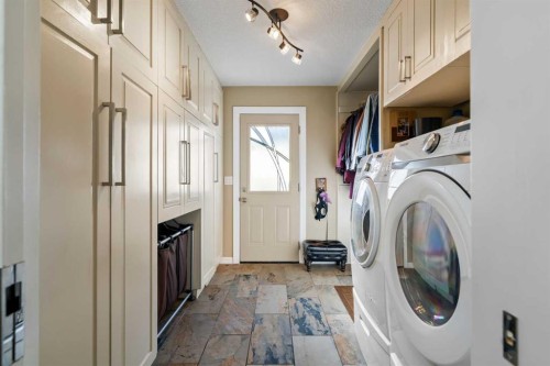 85 Sunset Way Se, Calgary, AB - Indoor Photo Showing Laundry Room