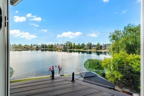 85 Sunset Way Se, Calgary, AB - Outdoor With Body Of Water With View