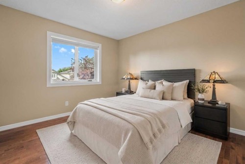 85 Sunset Way Se, Calgary, AB - Indoor Photo Showing Bedroom