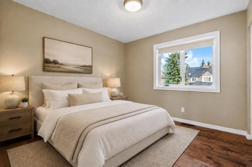 85 Sunset Way Se, Calgary, AB - Indoor Photo Showing Bedroom