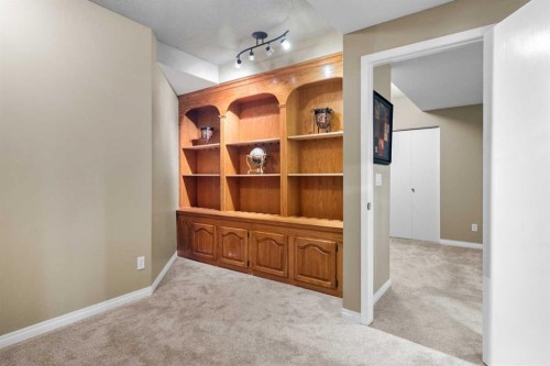 85 Sunset Way Se, Calgary, AB - Indoor Photo Showing Other Room