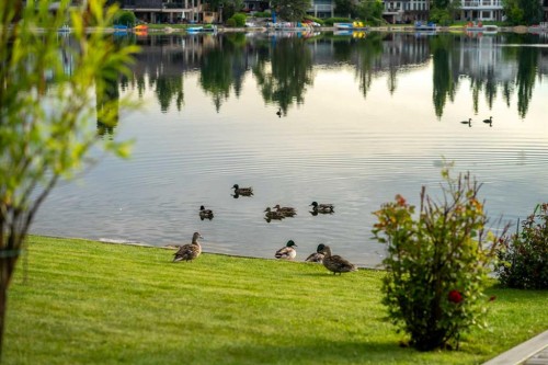 85 Sunset Way Se, Calgary, AB - Outdoor With Body Of Water With View
