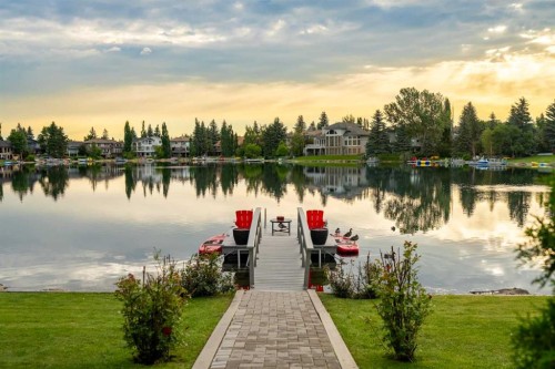 85 Sunset Way Se, Calgary, AB - Outdoor With Body Of Water With View
