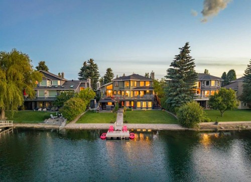 85 Sunset Way Se, Calgary, AB - Outdoor With Body Of Water
