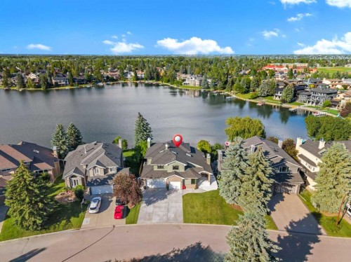 85 Sunset Way Se, Calgary, AB - Outdoor With Body Of Water With View