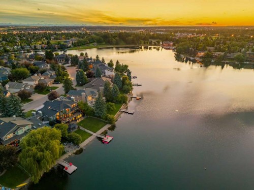 85 Sunset Way Se, Calgary, AB - Outdoor With Body Of Water With View