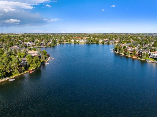 85 Sunset Way Se, Calgary, AB - Outdoor With Body Of Water With View