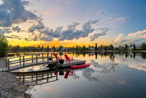 85 Sunset Way Se, Calgary, AB - Outdoor With Body Of Water With View