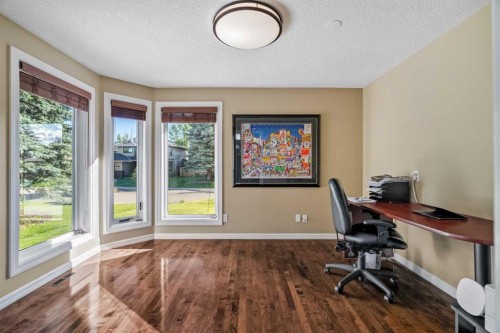 85 Sunset Way Se, Calgary, AB - Indoor Photo Showing Other Room