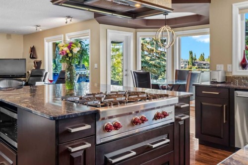 85 Sunset Way Se, Calgary, AB - Indoor Photo Showing Kitchen With Double Sink